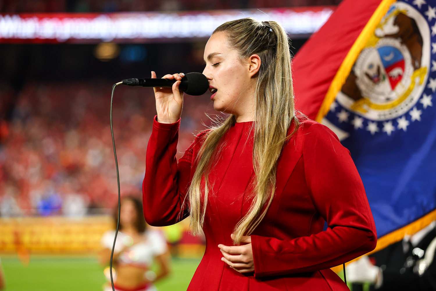 Grace Kinstler singing the National Anthem prior to an NFL football game against the Detroit Lions, Sunday, October 12, 2025 in Kansas City.