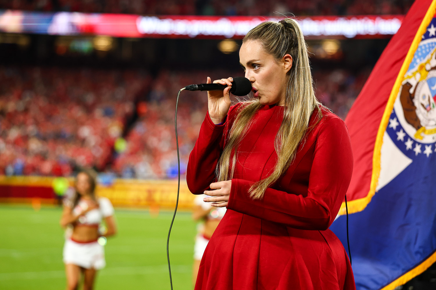 Grace Kinstler singing the National Anthem prior to an NFL football game against the Detroit Lions, Sunday, October 12, 2025 in Kansas City.