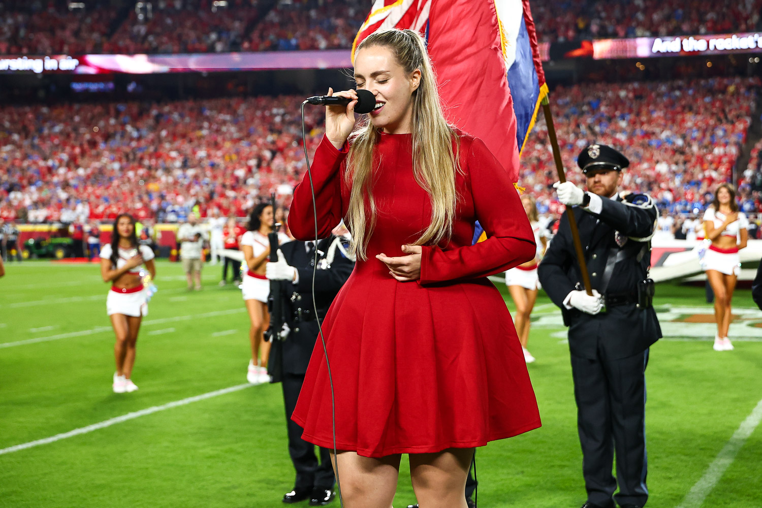 Grace Kinstler singing the National Anthem prior to an NFL football game against the Detroit Lions, Sunday, October 12, 2025 in Kansas City.