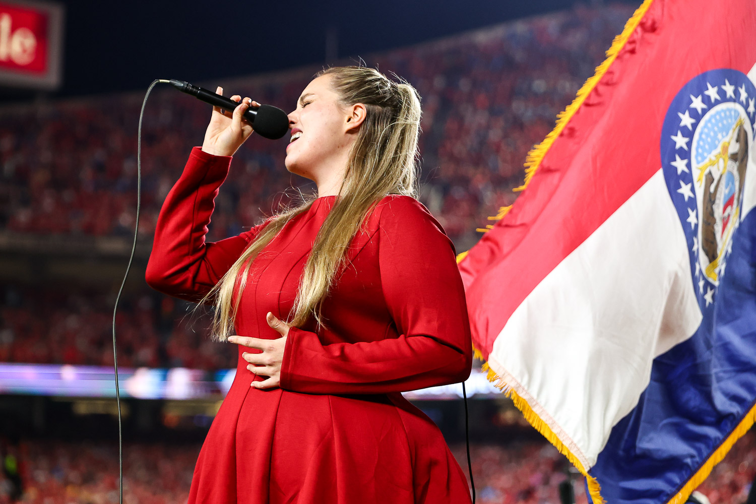 Grace Kinstler singing the National Anthem prior to an NFL football game against the Detroit Lions, Sunday, October 12, 2025 in Kansas City.