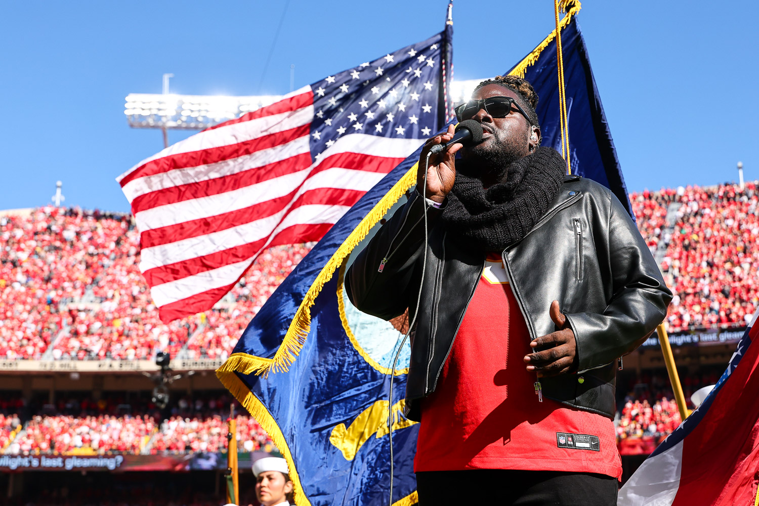 Pershard Owens sings the National Anthem prior to an NFL football game against the Las Vegas Raiders, Sunday, October 19, 2025 in Kansas City.